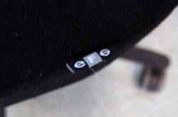 Kontorstol fra EFG, modell ALLEGRO, i sort stoff, nakkepute, uten armlene, pent brukt