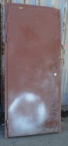 Ståldør / branndør i rødlakkert stål fra Ulefoss Brug, klasse: A60, bredde karm 95cm, høyde karm 212cm, brukt