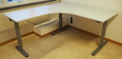 Skrivebord / hjørneløsning med elektrisk hevsenk fra EFG i lys grå, 160x180, venstreløsning, pent brukt
