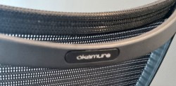 Konferansestol i sort mesh / krom med armlene fra Okamura, modell CP, pent brukt