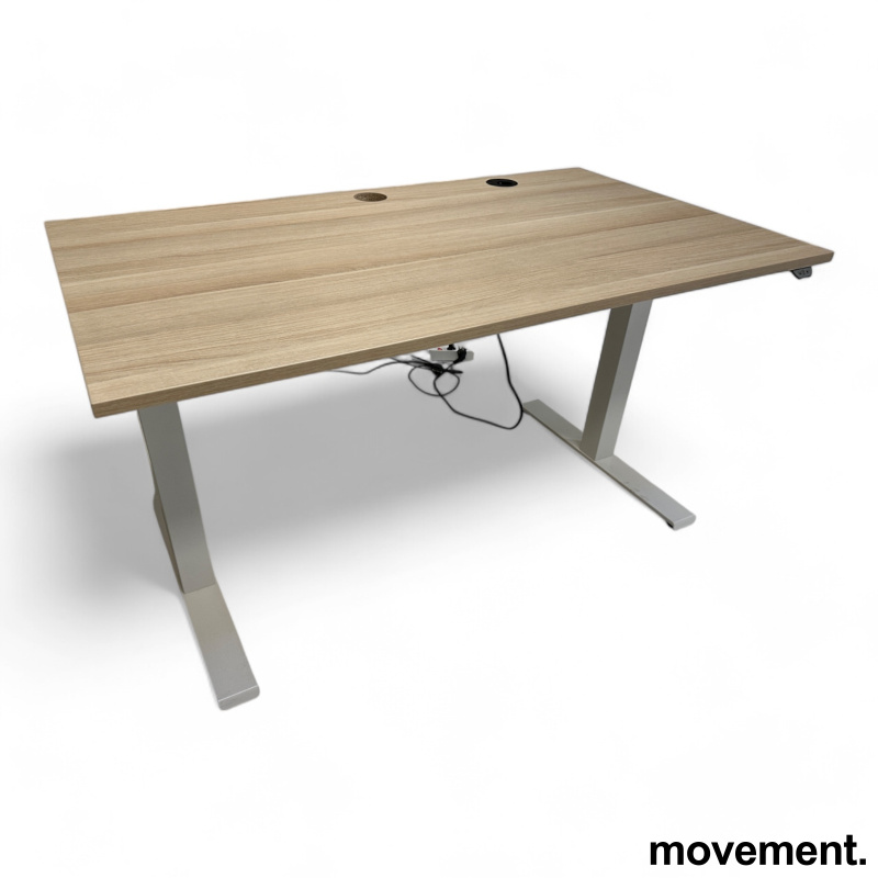Skrivebord med elektrisk hevsenk - 1 / 4